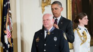 WASHINGTON, DC - MAY 16: U.S. President Barack Obama presents Garland Police Officer Gregory Stevens the Medal of Valor during a ceremony in the East Room of the White House, May 16, 2016, in Washington, DC. Established by President Bill Clinton in 2000 and officially recognized by Congress in 2001, the Medal of Valor is the nation's highest honor for law enforcement. 13 police officers are receiving the honor this year. (Photo by Drew Angerer/Getty Images)